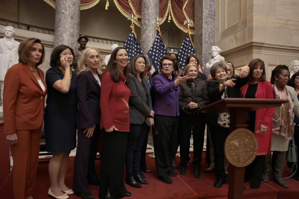 House Speaker Nancy Pelosi and former professional tennis player Billie Jean King with members of Congress at the U.S. Capitol Building on March 9, 2022. Congress could put forward an amendment to strengthen Title IX, but the political ramifications are real. (Anna Moneymaker/Getty Images)
