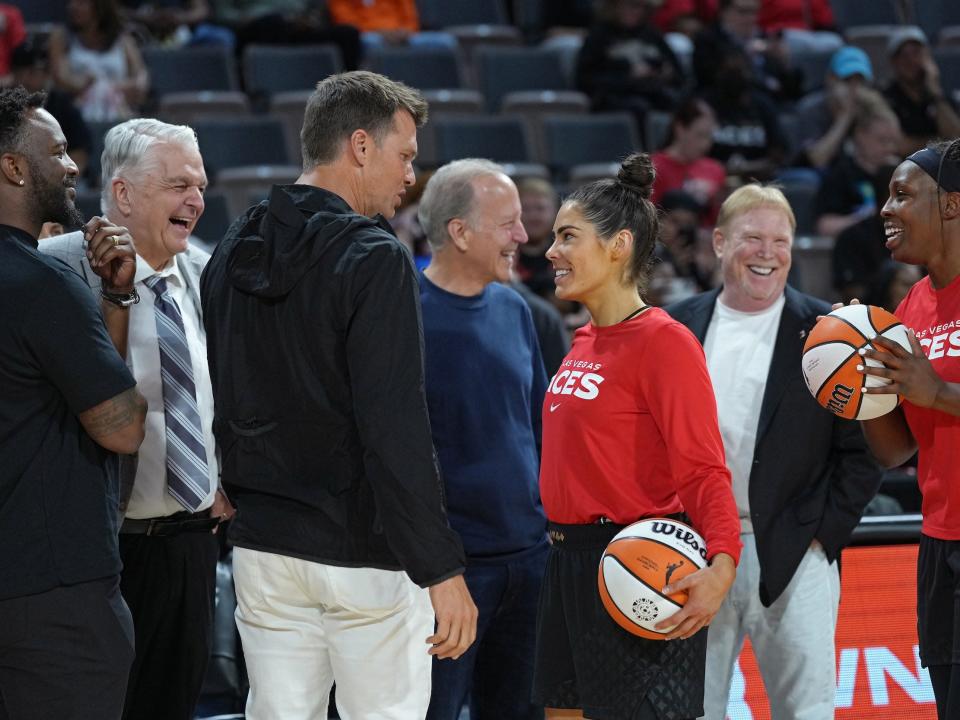 Kelsey Plum (right) met Tom Brady at the Las Vegas Aces game.