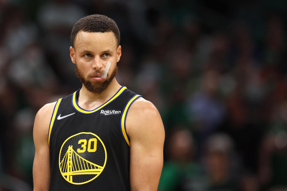 Golden State Warriors star Stephen Curry looks on in the fourth quarter against the Boston Celtics during Game 3 of the 2022 NBA Finals at TD Garden in Boston, on June 8, 2022. (Maddie Meyer/Getty Images)