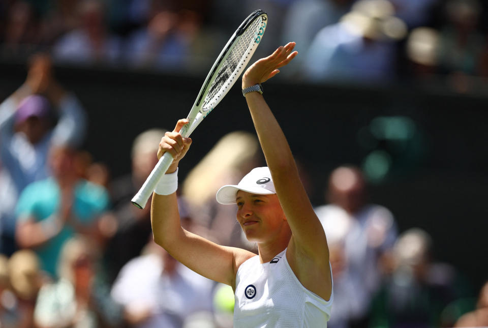 Tennis - Wimbledon - All England Lawn Tennis and Croquet Club, London, Britain - June 28, 2022 Poland's Iga Swiatek celebrates winning her first round match against Croatia's Jana Fett REUTERS/Hannah Mckay