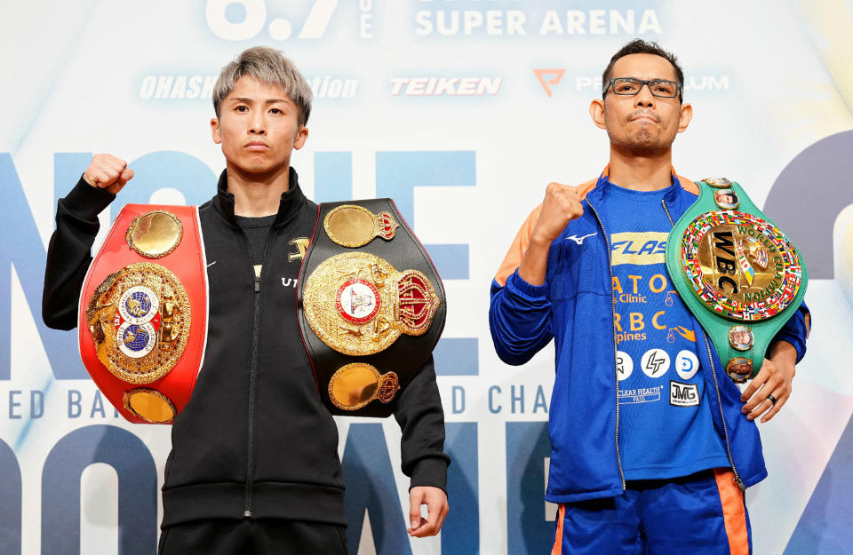 IBF and WBA bantamweight boxing champion Naoya Inoue of Japan (L) and WBC champion Nonito Donaire of Philippines (R) pose during a press event in Yokohama, Kanagawa prefecture on June 3, 2022. - Donaire said on June 3, 2022 there was 