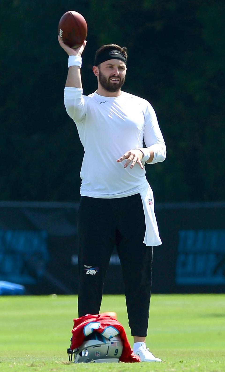 Carolina Panthers quarterback Baker Mayfield tosses a ball back to a teammate prior to the start of drills at practice on Wednesday, July 27, 2022 at Wofford College in Spartanburg, SC.