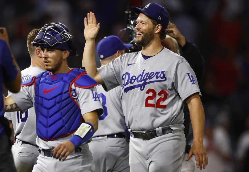 ANAHEIM, CALIFORNIA - JULY 15: Clayton Kershaw #22 of the Los Angeles Dodgers celebrates.