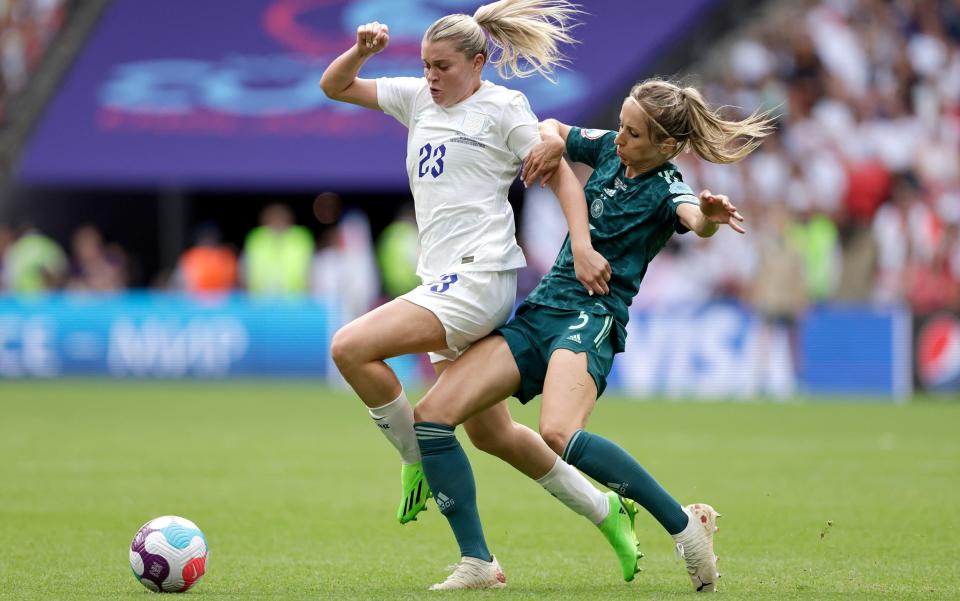 Alessia Russo of England and Marina Hegering of Germany battle - Getty