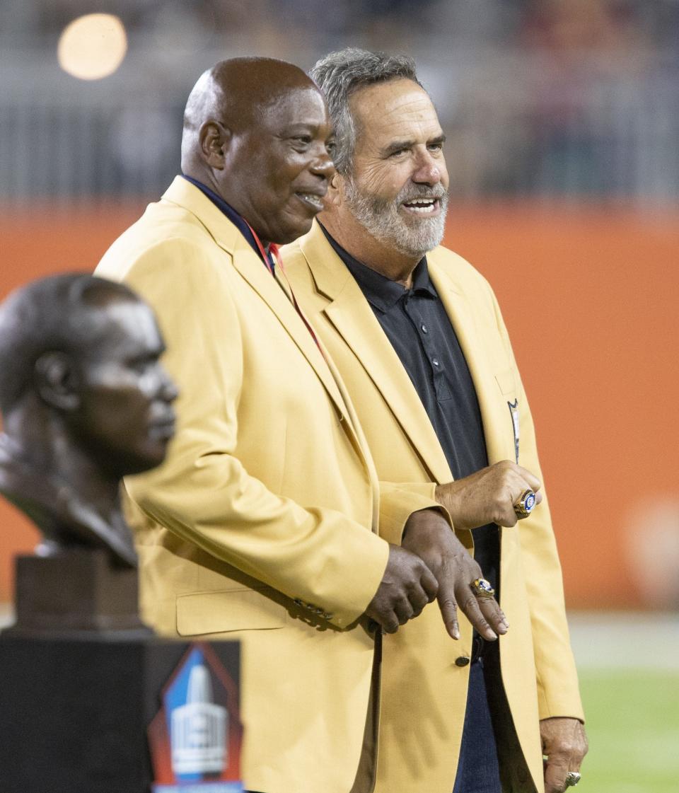 Ozzie Newsome (left) and Dan Fouts were presented their RIngs of Honor during the halftime celebration of the Professional Football Hall of Fame Game Thursday, August 2, 2018.