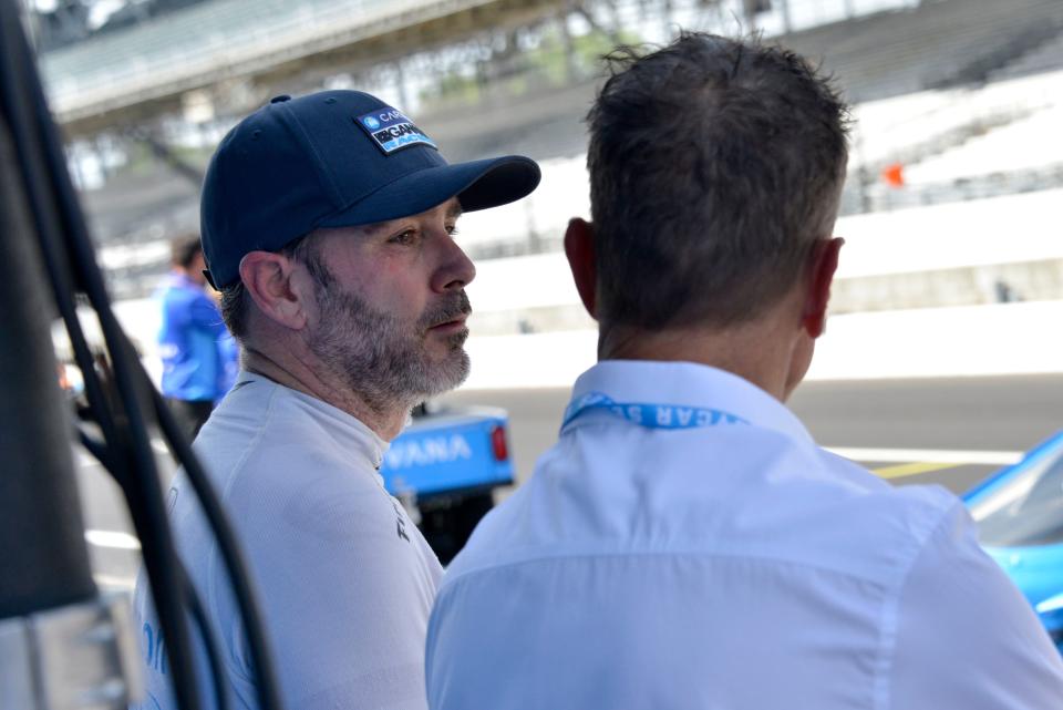 Chip Ganassi Racing driver Jimmie Johnson (48) stands by his pit box Friday, July 29, 2022, during practice for the Gallagher Grand Prix at Indianapolis Motor Speedway.