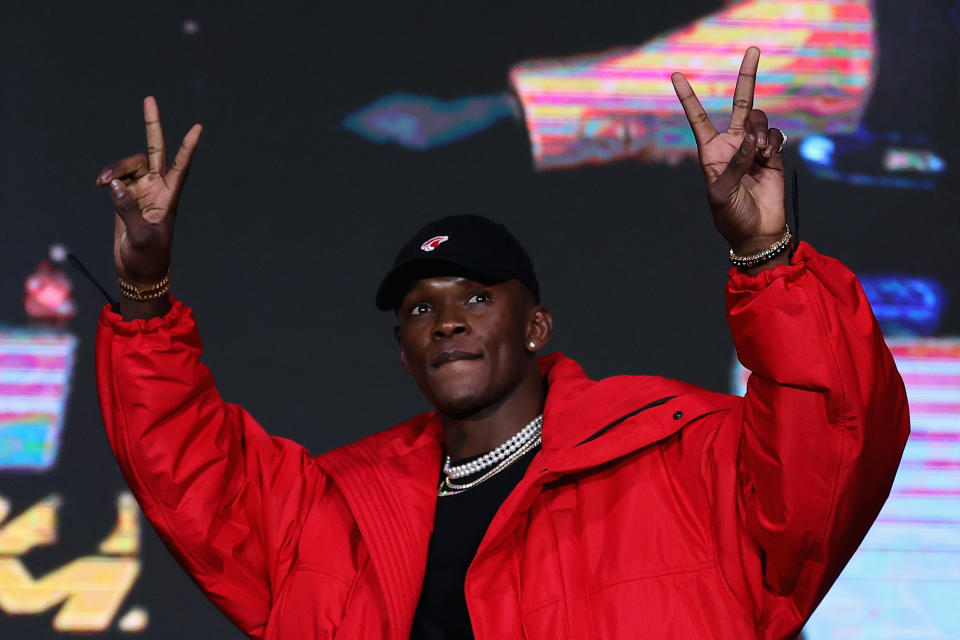 SYDNEY, AUSTRALIA - JUNE 21: Israel Adesanya walks on stage during a media opportunity in promotion of UFC 276 (Adesanya v Cannonier) and UFC 277 (Pena v Nunes), at The Star on June 21, 2022 in Sydney, Australia. (Photo by Cameron Spencer/Getty Images for UFC)