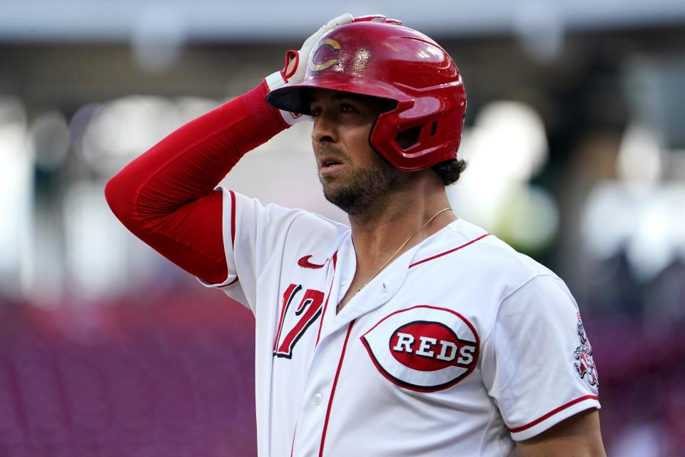 Cincinnati Reds shortstop Kyle Farmer (17) steps out of the batterÕs box during the first inning of a baseball game against the Miami Marlins, Wednesday, July 27, 2022, at Great American Ball Park in Cincinnati. 