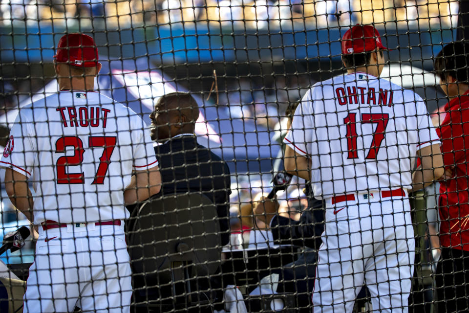 LOS ANGELES, CA - JULY 18, 2022: Angels Mike Trout and two-way star Shohei Ohtani stand for interviews during All Star Workouts at Dodger Stadium on July 18, 2022 in Los Angeles, California.(Gina Ferazzi / Los Angeles Times via Getty Images)