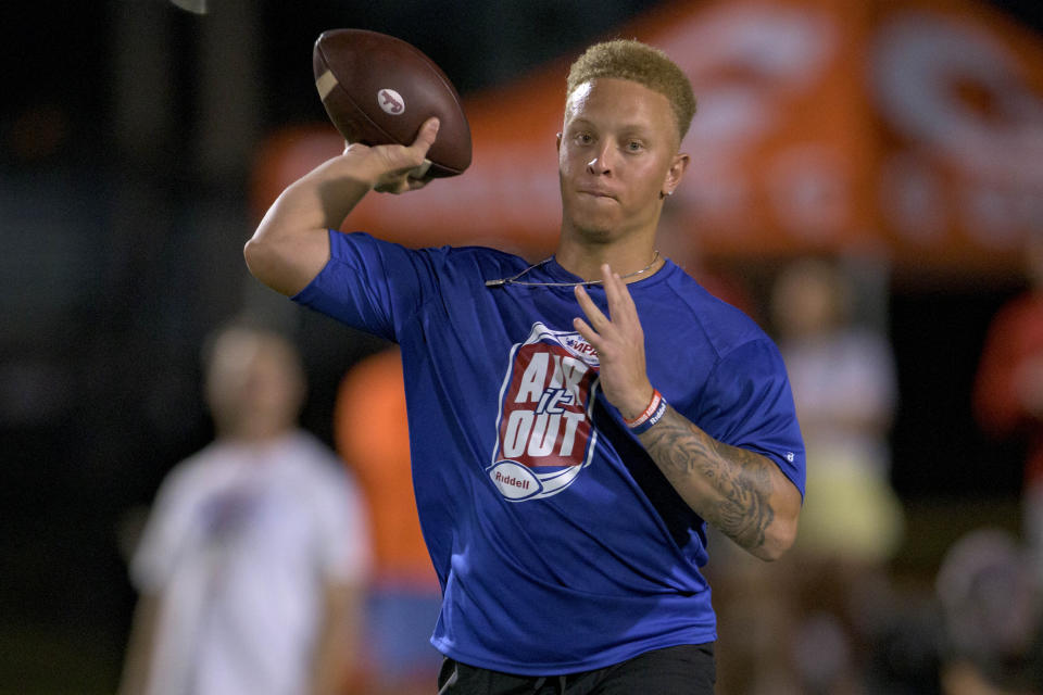 South Carolina quarterback Spencer Rattler throws at the Manning Passing Academy on the Nicholls State University campus in Thibodaux, La. Friday, June 24, 2022. (AP Photo/Matthew Hinton)