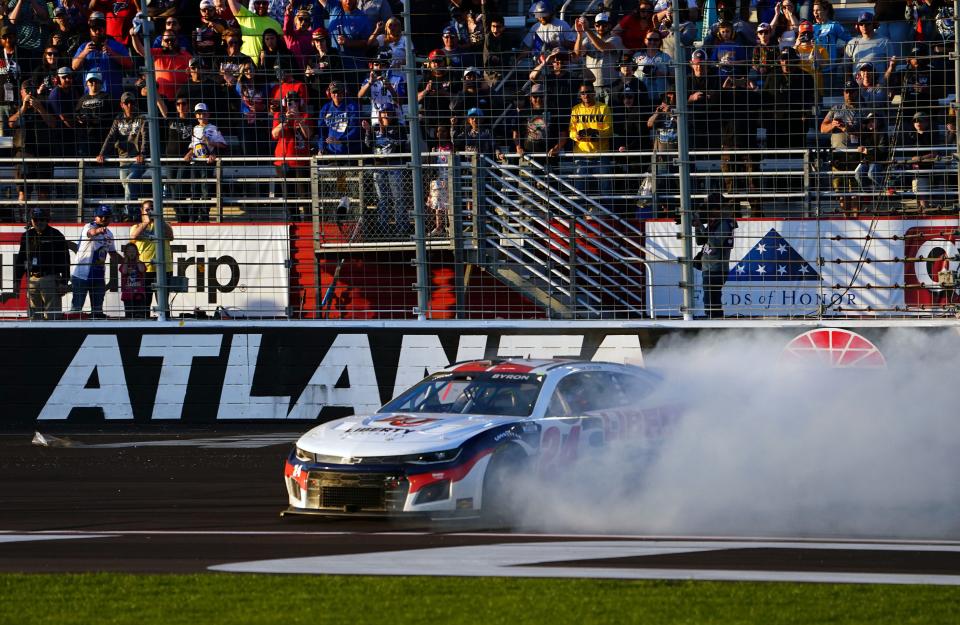 William Byron performs a burnout after winning the Folds of Honor QuikTrip 500 at Atlanta Motor Speedway March 20, 2022.