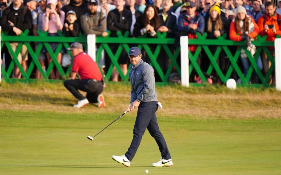 Northern Ireland's Rory McIlroy reacts after a missed birdie on the 18th during day two - PA