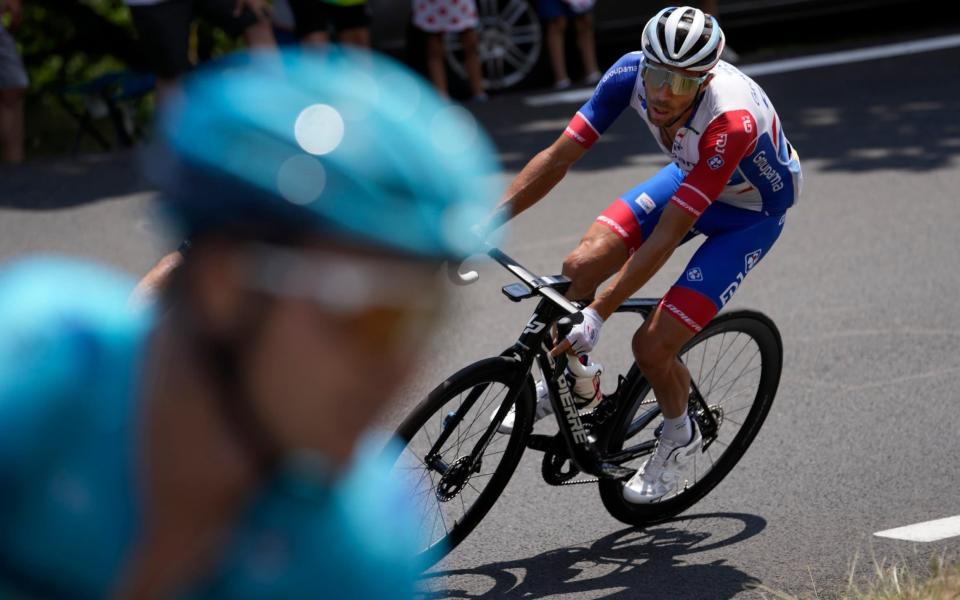 Thibaut Pinot follows Alexey Lutsenko&nbsp; - AP