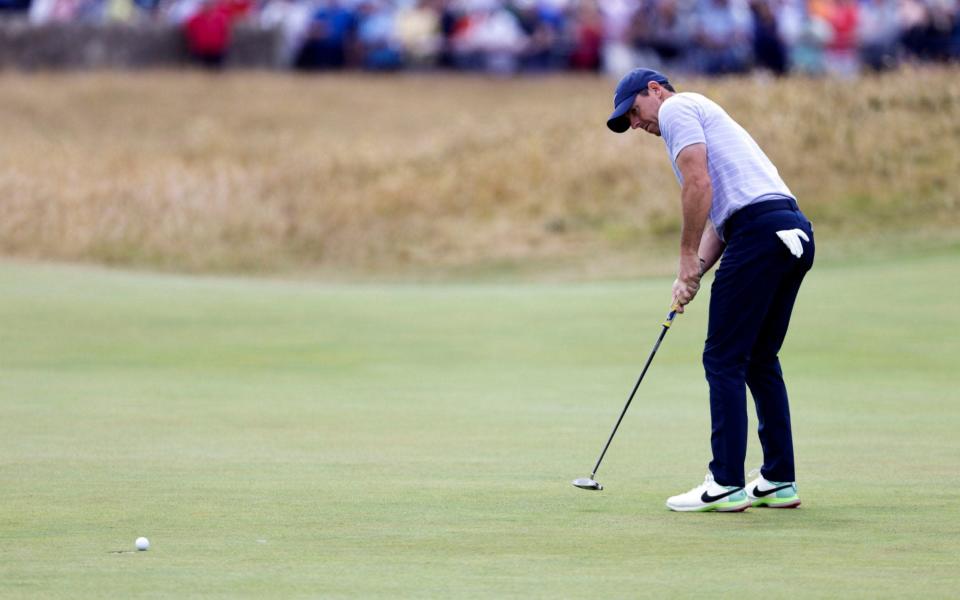 Northern Ireland's Rory McIlroy putts on the 1st green during day two of The Open at the Old Course - PA