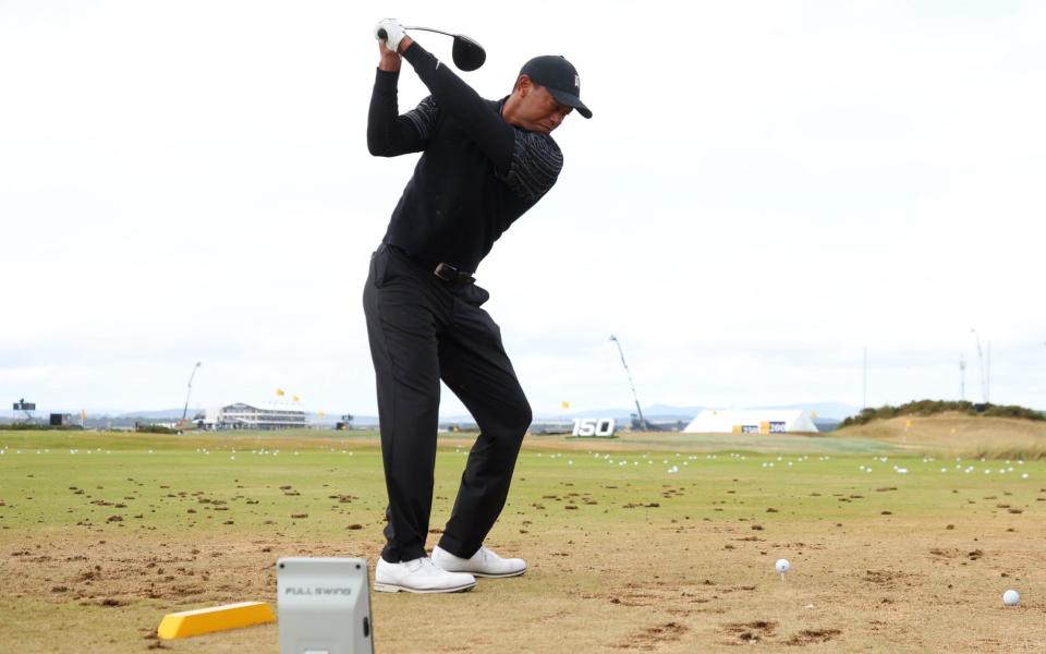 Tiger Woods on the range ahead of his first round - GETTY IMAGES