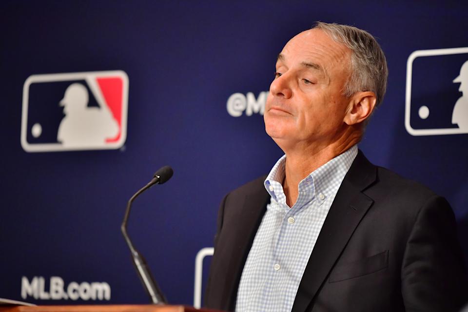 ORLANDO, FLORIDA - FEBRUARY 10: Major League Baseball Commissioner Rob Manfred answers questions during an MLB owner's meeting at the Waldorf Astoria on February 10, 2022 in Orlando, Florida. Manfred addressed the ongoing lockout of players, which owners put in place after the league's collective bargaining agreement ended on December 1, 2021. (Photo by Julio Aguilar/Getty Images)