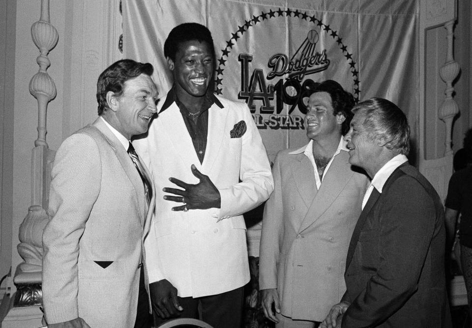 NL manager Chuck Tanner, Houston pitcher J.R. Richard, Baltimore pitcher Steve Stone and AL manager Earl Weaver talk in 1980