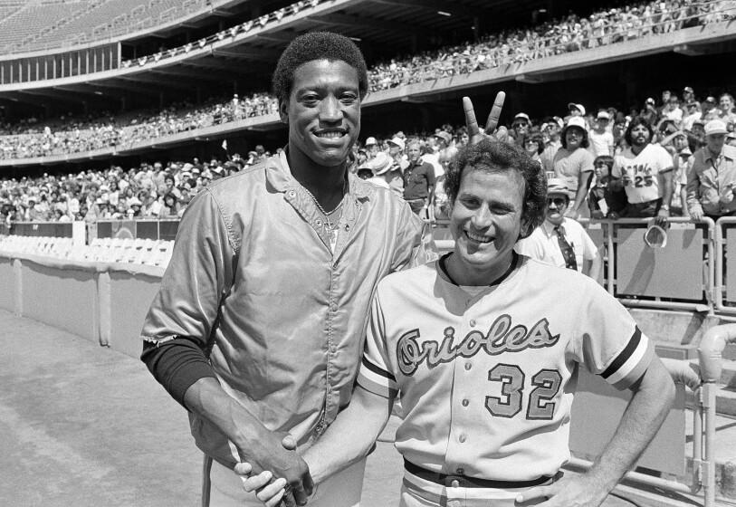 Houston's pitcher J.R. Richard, left, puts the hex on Baltimore Orioles pitcher Steve Stone.