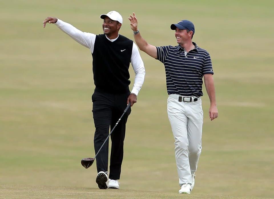 Tiger Woods (left) and Rory McIlroy on the 18th fairway during the R&amp;A Celebration of Champions event at the Old Course, St Andrews (Richard Sellers/PA) (PA Wire)