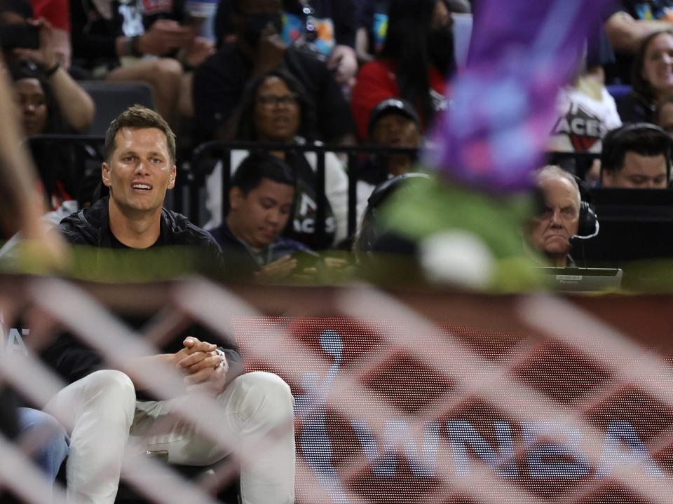 Tom Brady sits courtside at a Las Vegas Aces game.