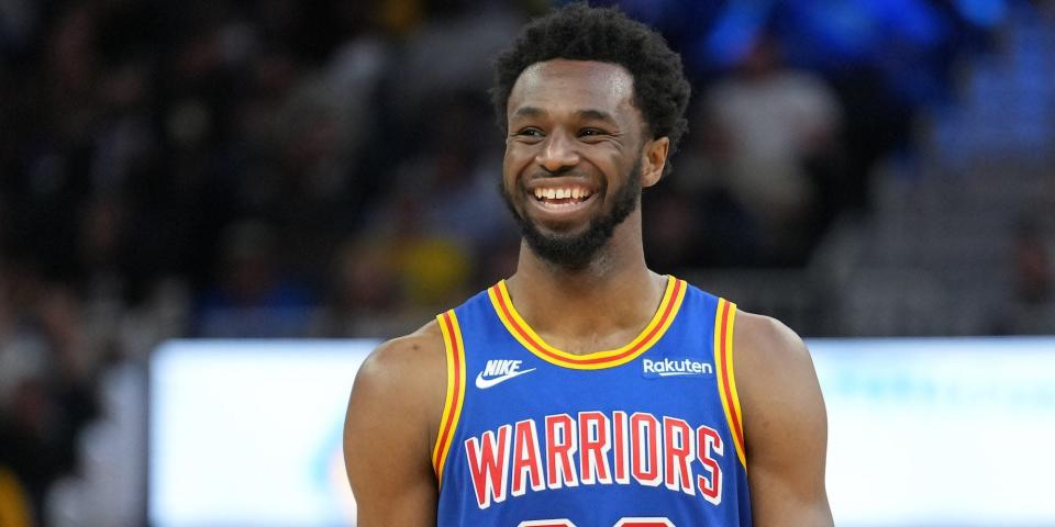 Andrew Wiggins smiles during a game.