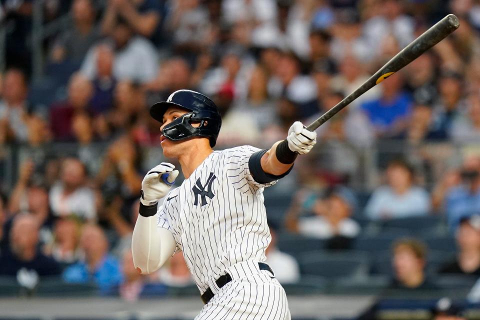 New York Yankees' Aaron Judge watches his two-run home run during the third inning of a baseball game against the Kansas City Royals, Friday, July 29, 2022, in New York. (AP Photo/Frank Franklin II)