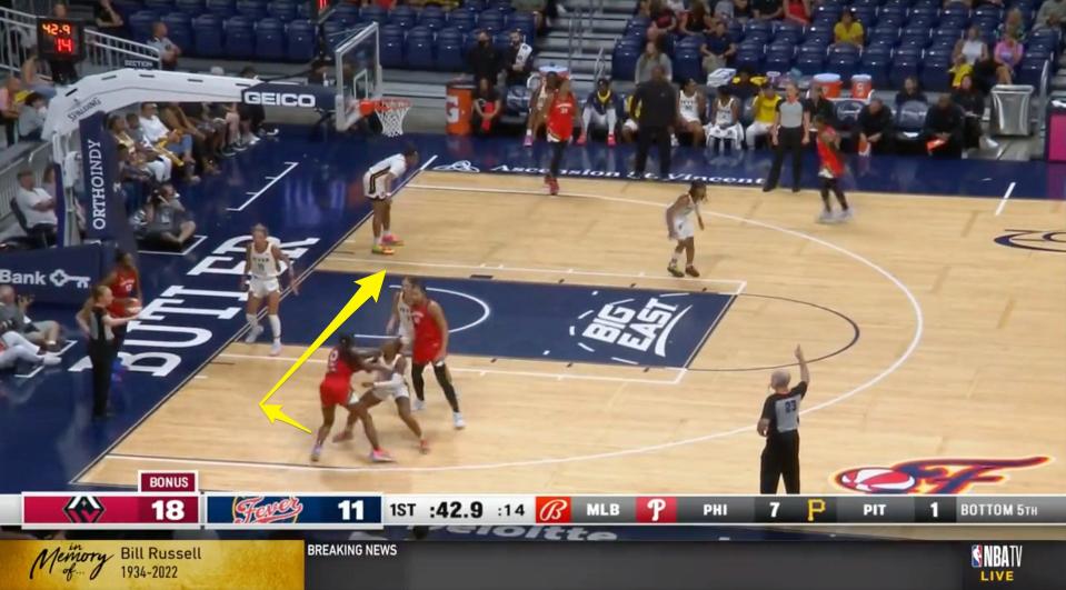 Jackie Young breaks through the Indiana Fever's defense.