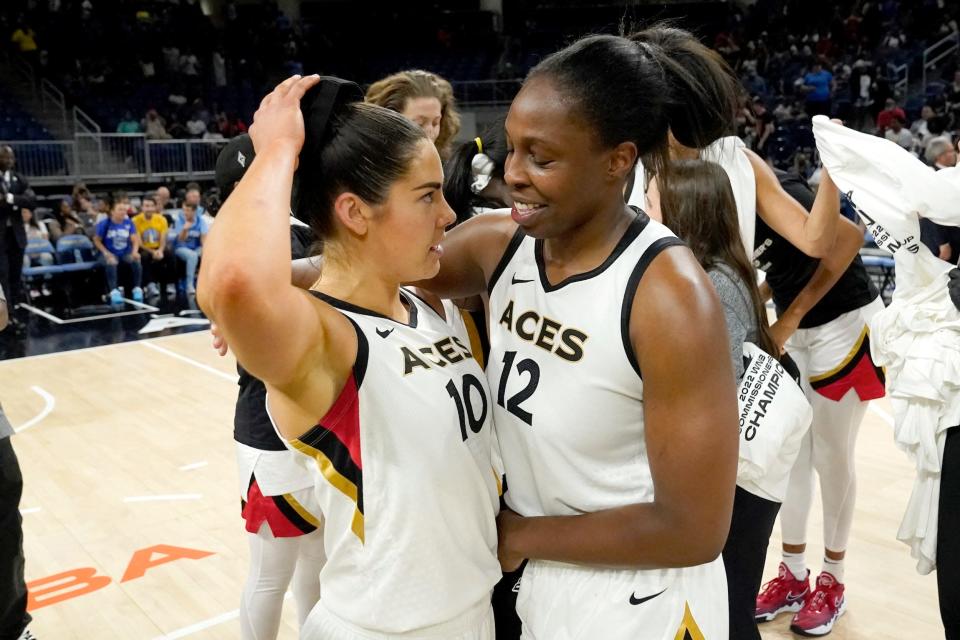 Kelsey Plum (left) and Chelsea Gray celebrate winning the 2022 WNBA Commissioner's Cup.