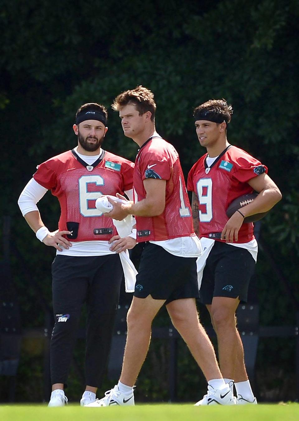 Carolina Panthers quarterbacks Baker Mayfield, left, Sam Darnold, center and Matt Corral, right, all may play in the team’s first exhibition at Washington Saturday.