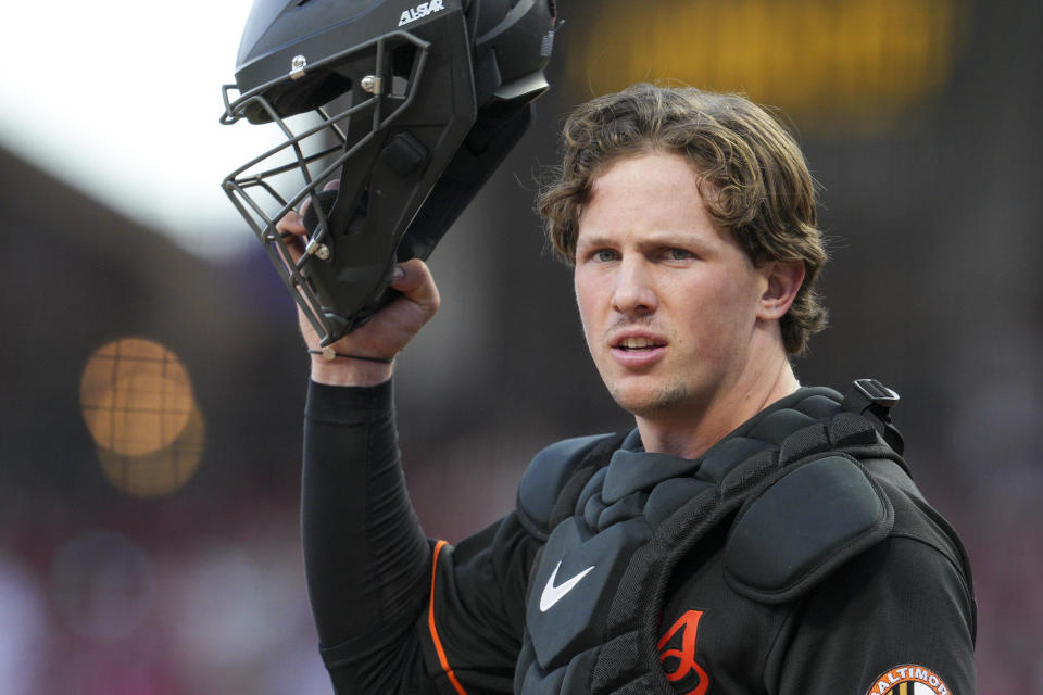 Baltimore Orioles catcher Adley Rutschman plays during a baseball game against the Cincinnati Reds Friday, July 29, 2022, in Cincinnati. (AP Photo/Jeff Dean)