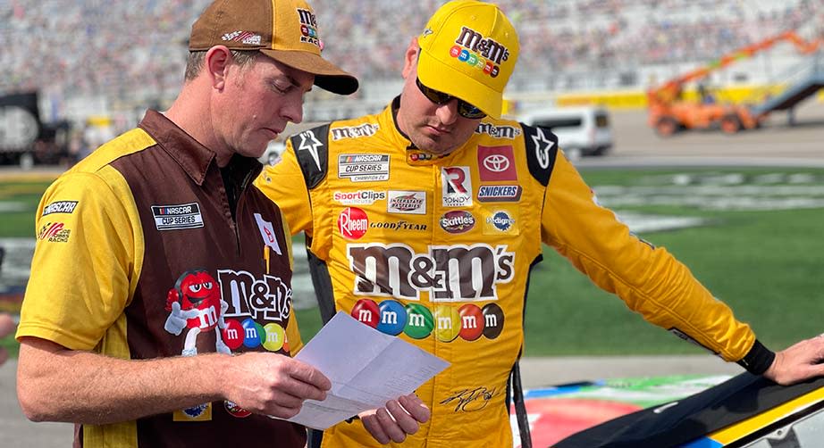 Kyle Busch and crew chief Ben Beshore chat before Sunday