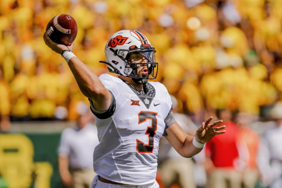 Oklahoma State quarterback Spencer Sanders passes against Baylor on Oct. 1.