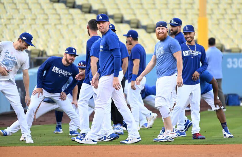 Los Angeles, California October10, 2022-Dodger players workout a day before the start of the NLDS at Dodgers Stadium. (Wally Skalij/Los Angeles Times)