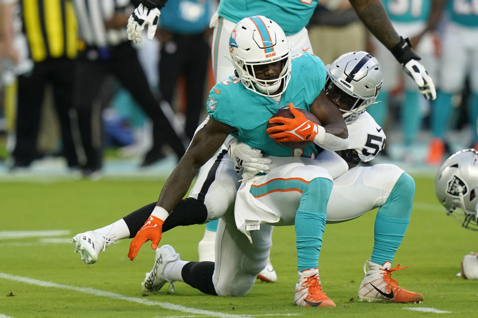 Dolphins running back Chase Edmonds has struggled to get touches of late, making a potential fantasy drop candidate. (AP Photo/Lynne Sladky)