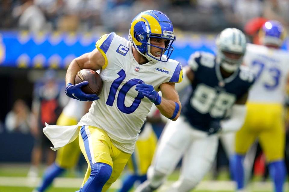 Los Angeles Rams wide receiver Cooper Kupp (10) sprints to the end zone for a touchdown in the first half of an NFL football game against the Dallas Cowboys on Sunday.