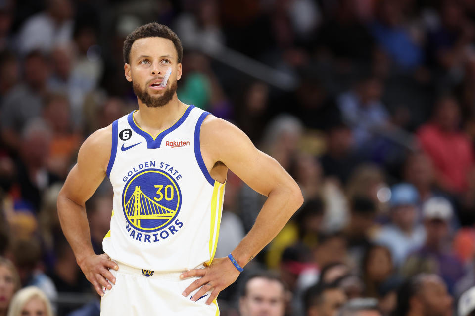 Stephen Curry is off to another blistering start, but his Golden State Warriors are easing into their NBA championship defense. (Christian Petersen/Getty Images)