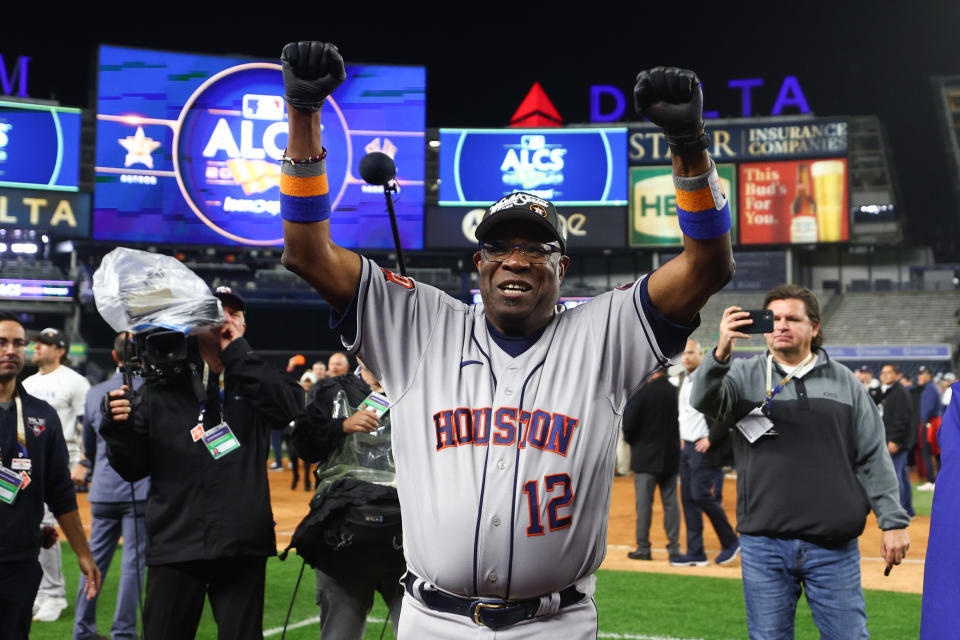 NEW YORK, NEW YORK - OCTOBER 23: Manager Dusty Baker Jr. #12 of the Houston Astros celebrates after winning game four of the American League Championship Series against the New York Yankees to advance to the World Series at Yankee Stadium on October 23, 2022 in the Bronx borough of New York City. (Photo by Elsa/Getty Images)