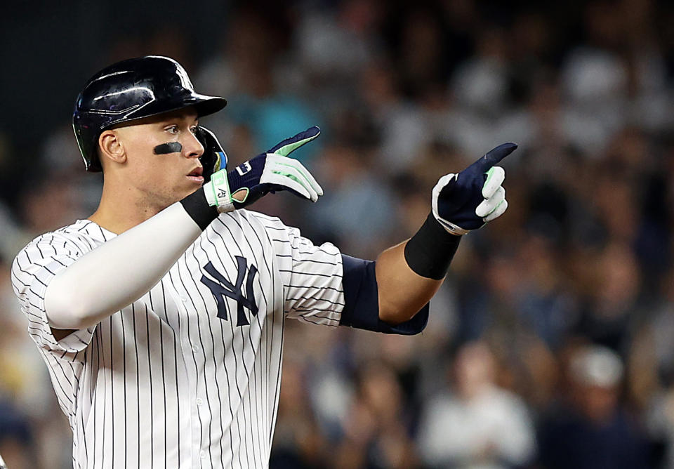 NEW YORK, NEW YORK - SEPTEMBER 21: Aaron Judge #99 of the New York Yankees reacts from second base after hitting a double during the 1st inning of the game against the Pittsburgh Pirates at Yankee Stadium on September 21, 2022 in the Bronx borough of New York City. (Photo by Jamie Squire/Getty Images)