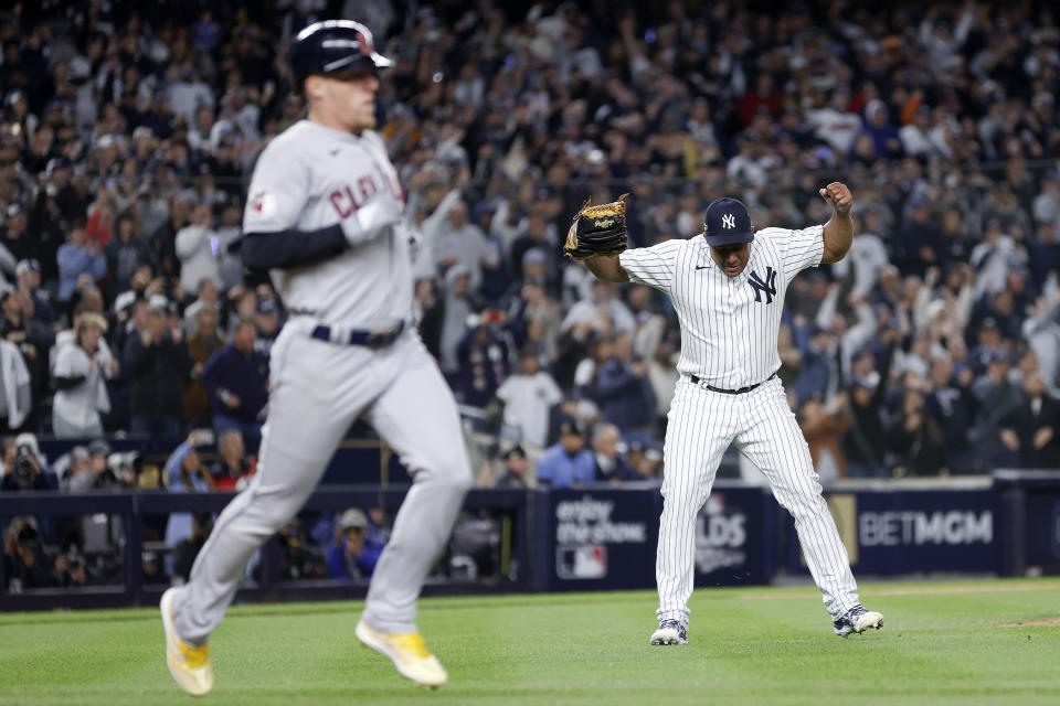 NEW YORK, NEW YORK - OCTOBER 18: Wandy Peralta #58 of the New York Yankees celebrates after defeating the Cleveland Guardians in game five of the American League Division Series at Yankee Stadium on October 18, 2022 in New York, New York. (Photo by Sarah Stier/Getty Images)