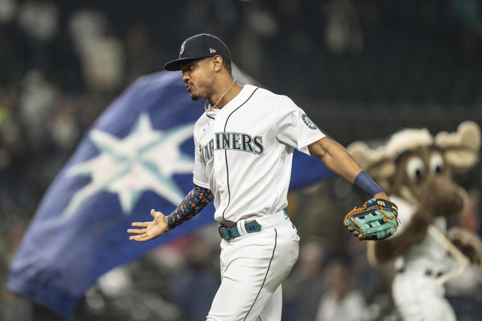 Seattle Mariners outfielder Julio Rodriguez just finished a fantastic rookie year, and now he's trying to help his team win in the playoffs. (AP Photo/Stephen Brashear)