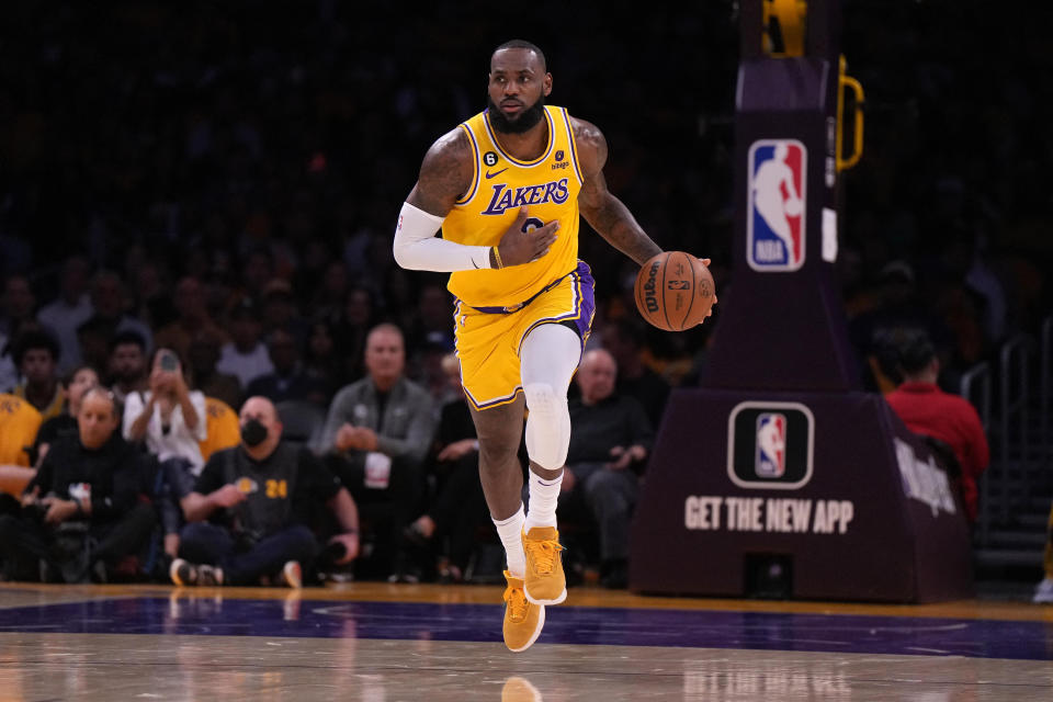 Oct 20, 2022; Los Angeles, California, USA; Los Angeles Lakers forward LeBron James (6) dribbles the ball against the LA Clippers in the first half at Crypto.com Arena. Mandatory Credit: Kirby Lee-USA TODAY Sports