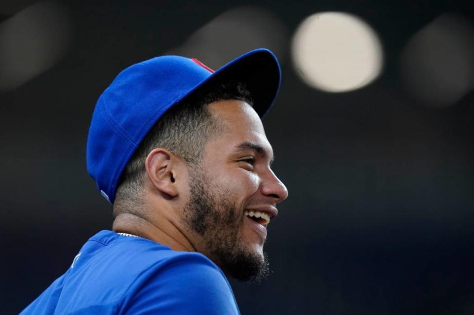 Chicago Cubs catcher Wilson Contreras watches from the dugout during a baseball game against the Miami Marlins, Tuesday, Sept. 20, 2022, in Miami. (AP Photo/Lynne Sladky)