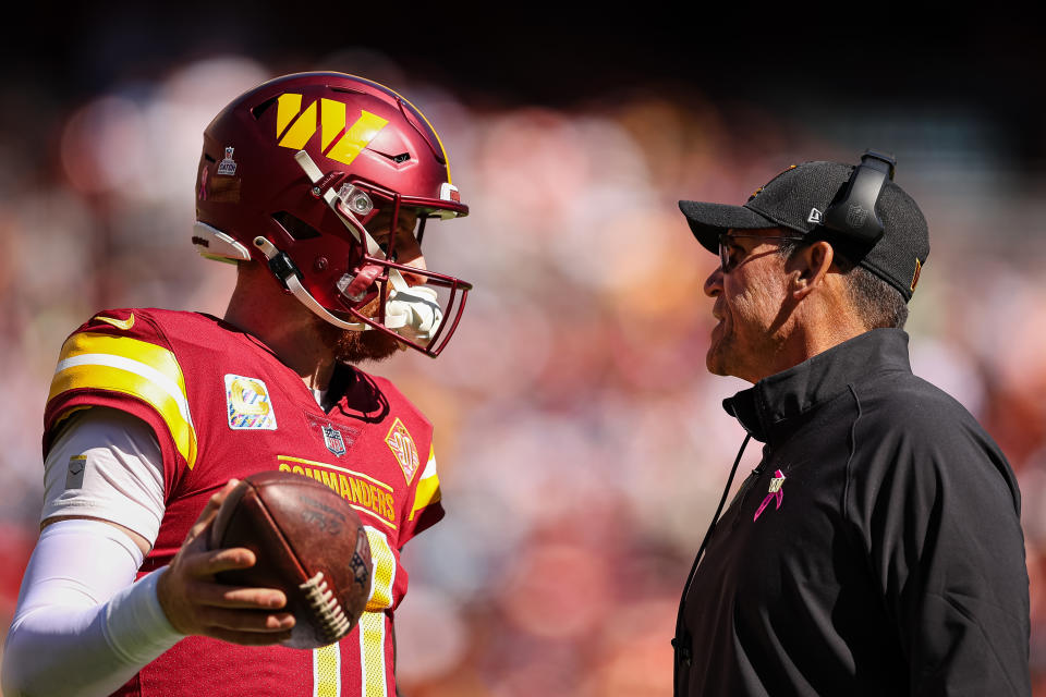 Carson Wentz, Ron Rivera and the Washington Commanders are facing the Chicago Bears on Thursday Night Football to open NFL Week 6. (Photo by Scott Taetsch/Getty Images)