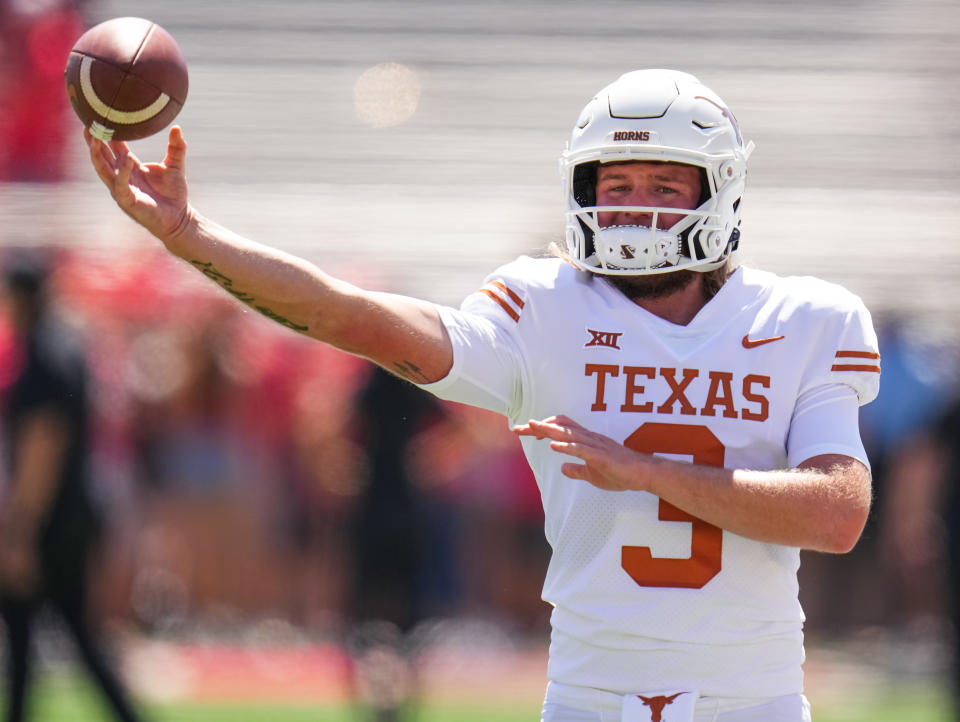 LUBBOCK, TEXAS - SEPTEMBER 24: Quinn Ewers #3 of the Texas Longhorns warms up prior to facing the Texas Tech Red Raiders at Jones AT&T Stadium on September 24, 2022 in Lubbock, Texas. (Photo by Josh Hedges/Getty Images)