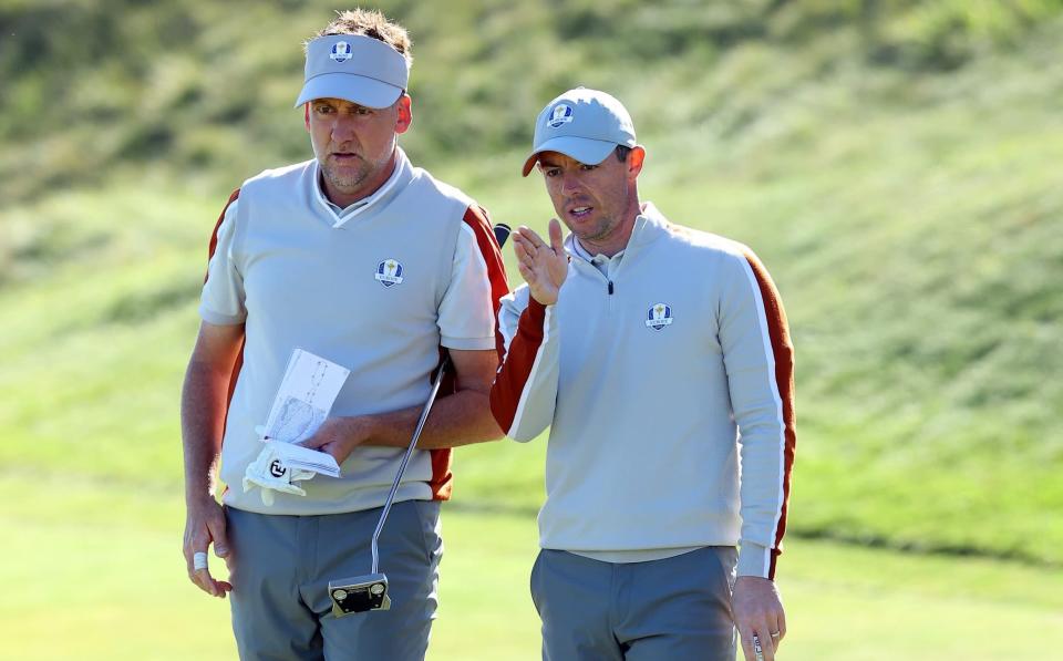 Rory McIlroy and Ian Poulter at the 2021 Ryder Cup - Rory McIlroy felt 'betrayed' by Ryder Cup team-mates - GETTY IMAGES/Andrew Redington 