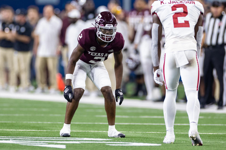 ARLINGTON, TX - SEPTEMBER 24: Texas A&M Aggies cornerback Denver Harris (#2) lines up opposite Arkansas Razorbacks wide receiver Ketron Jackson Jr. (#2) during the Southwest Classic college football game between the Texas A&M Aggies and the Arkansas Razorbacks on September 24, 2022 at AT&T Stadium in Arlington, TX. (Photo by Matthew Visinsky/Icon Sportswire via Getty Images)