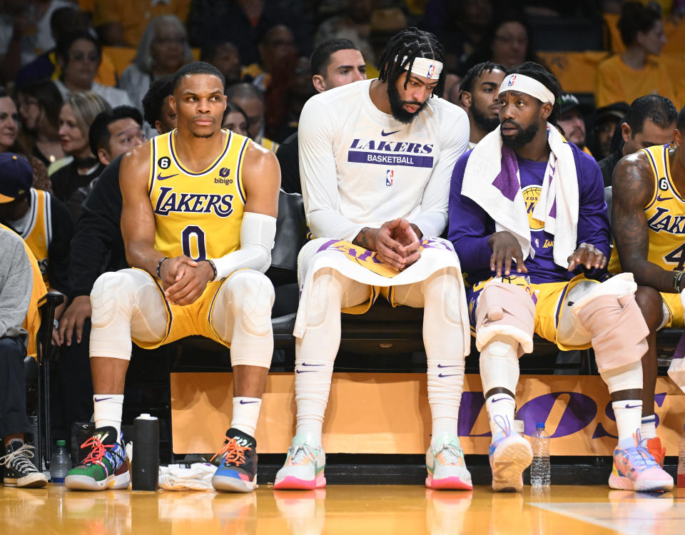 Russell Westbrook sits on the bench next to Anthony Davis and Patrick Beverley during the Los Angeles Lakers' game against the Los Angeles Clippers on Oct. 20, 2022 in Los Angeles. (Wally Skalij/Los Angeles Times via Getty Images)