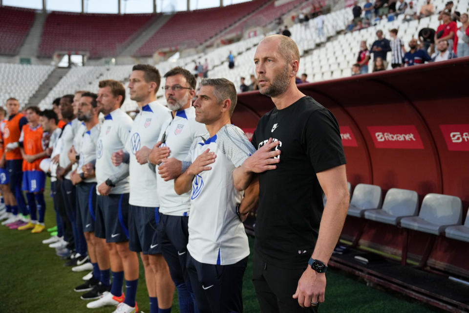 MURCIA, SPAIN - SEPTEMBER 27: Gregg Berhalter head coach of the United States and his bench stand during the National anthem during a game between Saudi Arabia and USMNT at Estadio Nueva Condomina on September 27, 2022 in Murcia, Spain. (Photo by Brad Smith/ISI Photos/Getty Images)