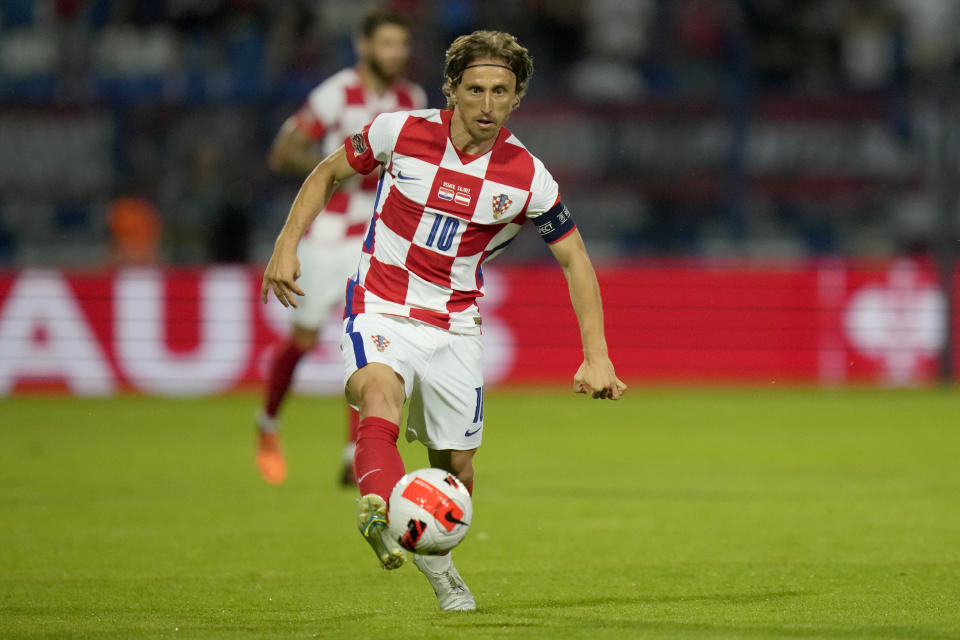 FILE - Croatia's Luka Modric is in action during the UEFA Nations League soccer match between Croatia and Austria at the Gradski Vrt stadium in Osijek, Croatia, Friday, June 3, 2022. (AP Photo/Darko Bandic)