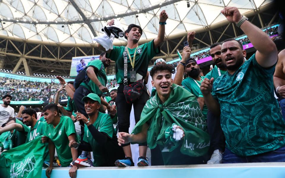 Saudi Arabian supporters celebrate following the FIFA World Cup Qatar 2022 Group C match - GETTY IMAGES/Alex Livesey
